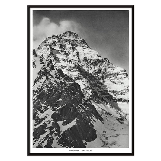 Black and white photograph and poster of K2 west face by Vittorio Sella showing the snow-covered mountain peak, with black aluminium frame on white background