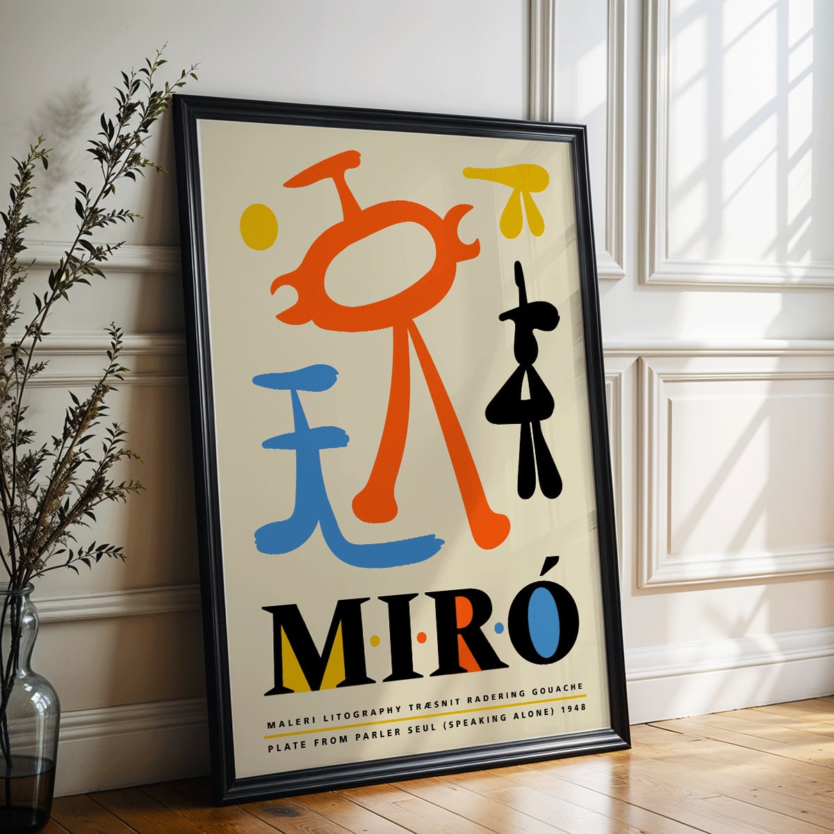 Exhibition poster inspired by Joan Miro and artwork Parler Seul featuring colorful abstract shapes and bold typography, framed and displayed in home decor