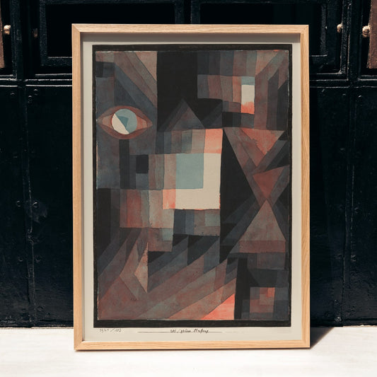 Geometric abstract painting in red and green with vertical patterns and shapes by Paul Klee titled Abstract Red and Green Gradation featuring an eye and cinnabar accents in vertical format, framed and displayed in home decor