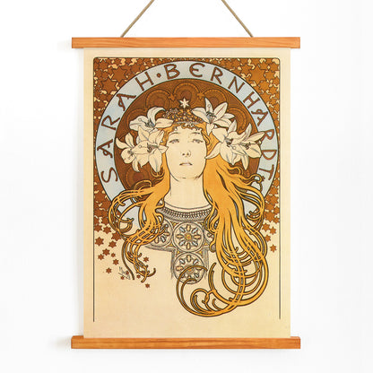 Art Nouveau poster of Sarah Bernhardt with flowing hair floral crown and lilies by Alphonse Mucha from La Plume, with wooden magnetic frame on white background