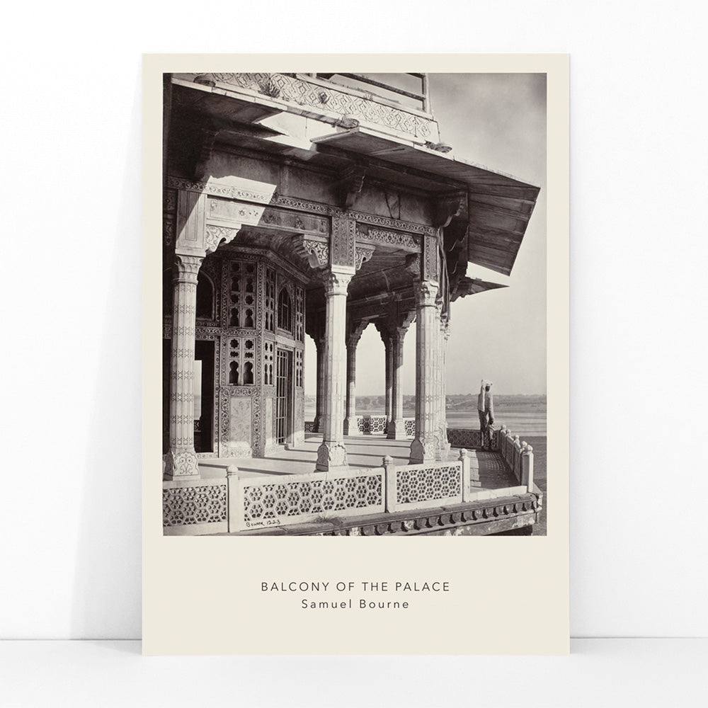 Architectural photography and poster of ornate palace balcony with intricate columns and carvings by Samuel Bourne titled Balcony of the Palace, framed and displayed in modern living room decor