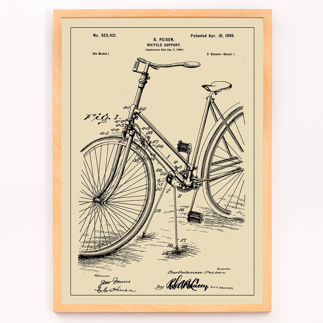 Bicycle support patent by B Peisen with detailed technical drawing and mechanical diagram featuring support stand and annotations, framed and displayed in modern living room decor