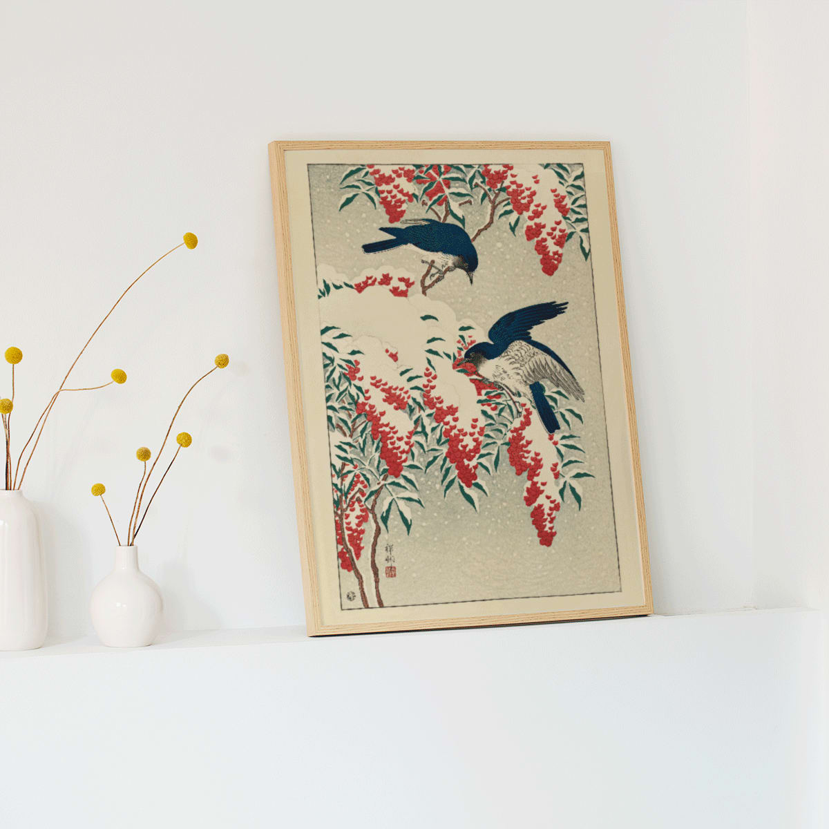 Two blue flycatchers on snow covered nandina bush artwork by Ohara Koson poster, framed and displayed in modern living room decor