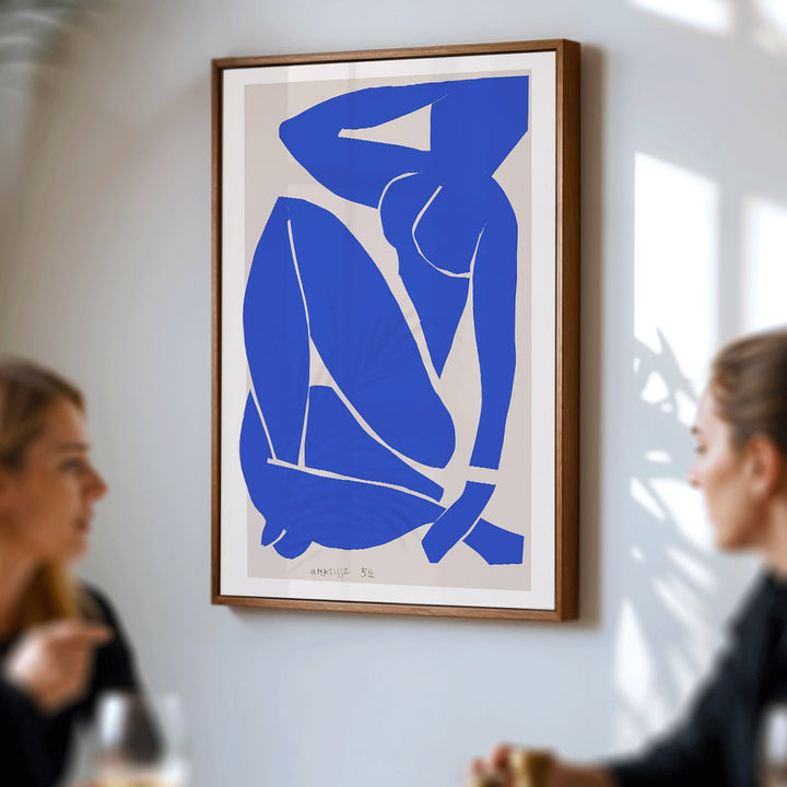 Nu Bleu III by Henri Matisse abstract blue figure on white background minimalist art poster, framed and displayed in modern living room decor