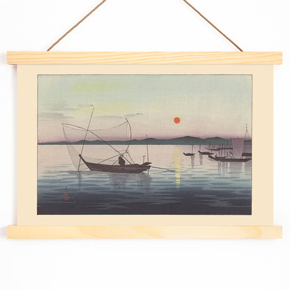 Traditional Japanese boats on calm water at sunset with mountains artwork by Ohara Koson, with wooden magnetic frame on white background