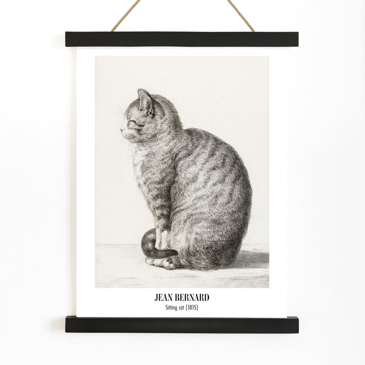 Detailed drawing of a sitting cat by Jean Bernard titled Sitting cat poster for home or office decor, with wooden magnetic frame on white background