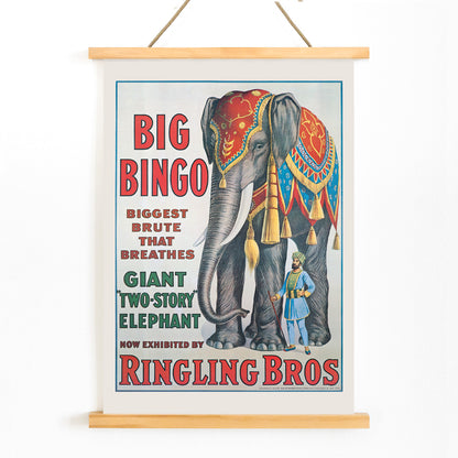 Colorful circus elephant and trainer poster artwork featuring Big Bingo a decorated giant elephant and circus keeper with vibrant circus themed graphics, with wooden magnetic frame on white background