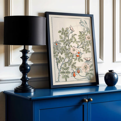 Floral poster of roses and leaves by Maurice Pillard Verneuil titled Eglantier with intricate pastel patterns, framed and displayed in modern living room decor