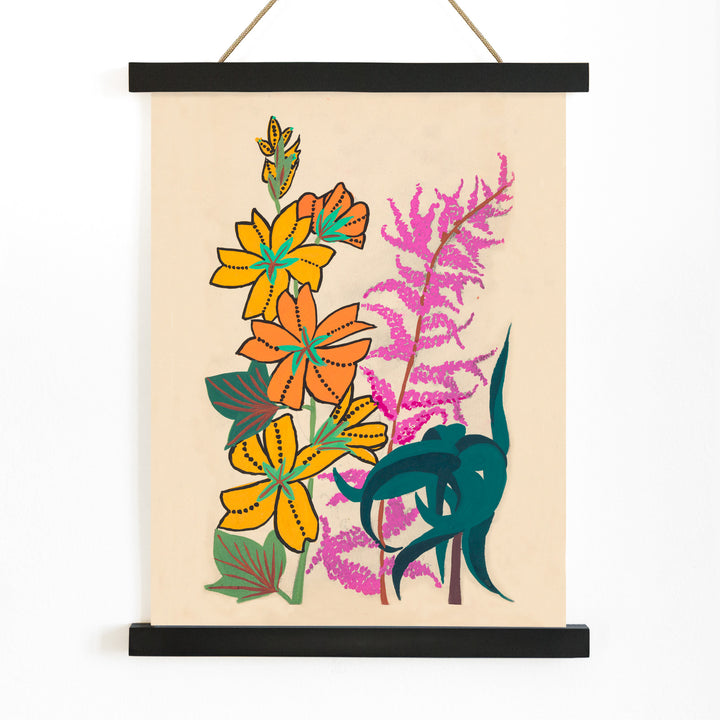 Colorful floral illustration of branches and leaves by Atelier Martine featuring vibrant orange yellow and pink flowers poster artwork, with wooden magnetic frame on white background