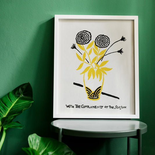 Yellow and black floral arrangement illustration and abstract flower poster in a vase with text With the Compliments of the Season by Henry Lyman Sayen, framed and displayed in home decor