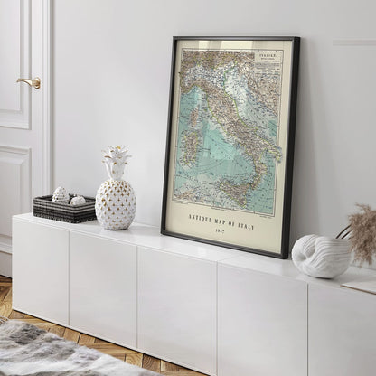 Colorful historical map of Italy by Institute of Liepzig German antique artwork with detailed geographical features, framed and displayed in home decor