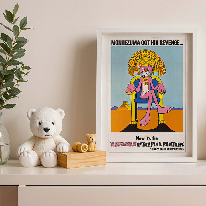 Pink Panther Montezuma themed artwork and poster titled Revenge of the Pink Panther featuring the Pink Panther sitting on a throne, framed and displayed in modern living room decor