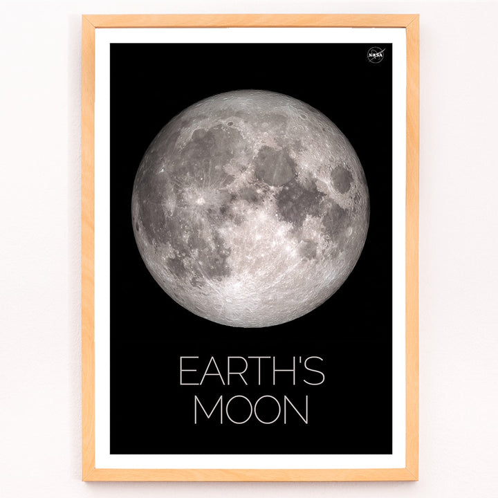 NASA poster of Earth Moon detailed lunar surface image with black background white border and labeled Moon, framed and displayed in modern living room decor