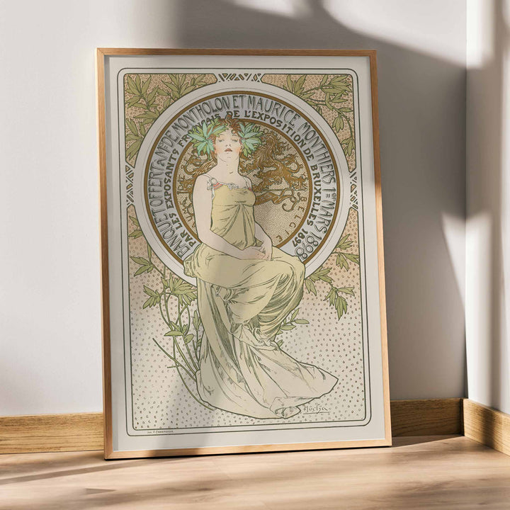 Alphonse Mucha Exposition de Bruxelles Art Nouveau poster with graceful woman and floral ornaments in soft green and beige tones, framed and displayed in modern living room decor