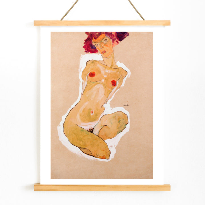 Colorful expressionist painting poster of a nude woman squatting titled Squatting Female Nude by Egon Schiele, with wooden magnetic frame on white background