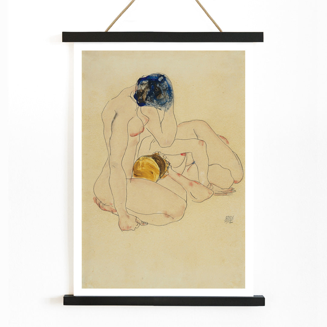 Two Friends by Egon Schiele poster featuring two nude figures in an intimate seated pose with expressive linework artwork, with wooden magnetic frame on white background