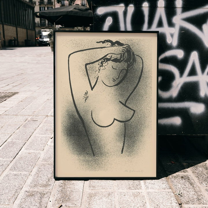 Minimalistic line art poster of a nude woman adjusting her hair by Mikulas Galanda titled Toaleta, framed and displayed in modern living room decor