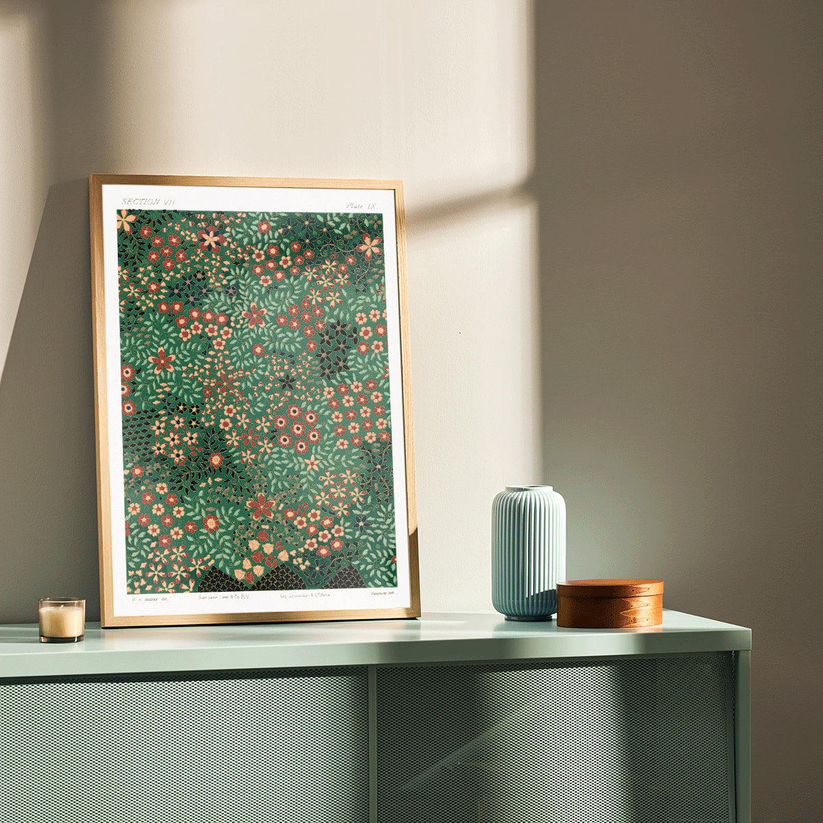 Floral pattern artwork poster by GA Audsley from The Ornamental Arts Of Japan featuring intricate vibrant green and red designs, framed and displayed in home decor