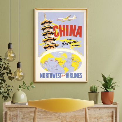 Vintage travel poster of China featuring a pagoda airplane and world map promoting the overland route by Northwest Orient Airlines, framed and displayed in home decor