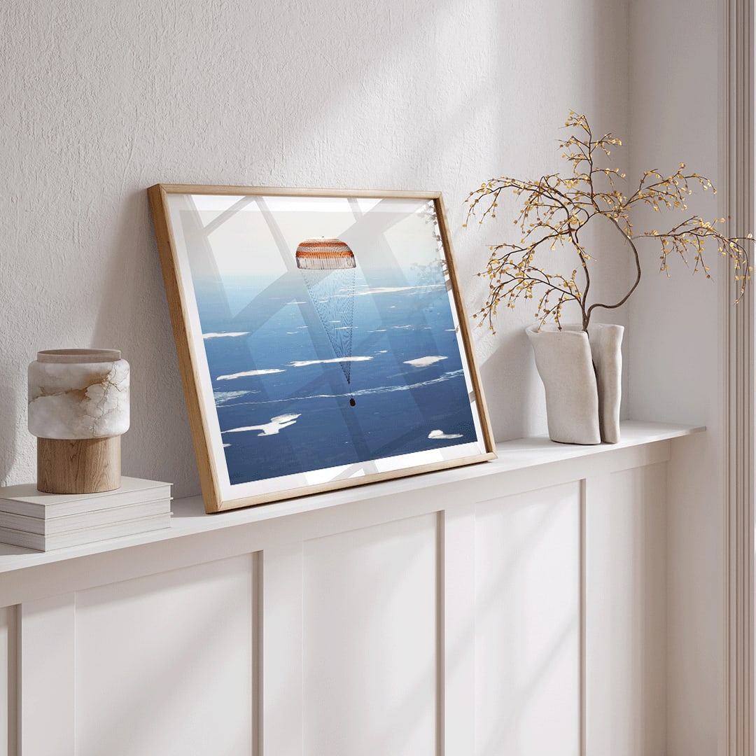 Soyuz MS-02 spacecraft descending with parachute over Kazakhstan NASA poster artwork showing landing, framed and displayed in home decor