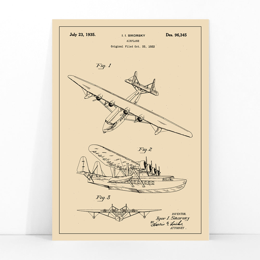 Detailed technical drawing and poster of a seaplane airplane patent by Igor I Sikorsky featuring multiple views and aircraft design sketches, framed and displayed in modern living room decor