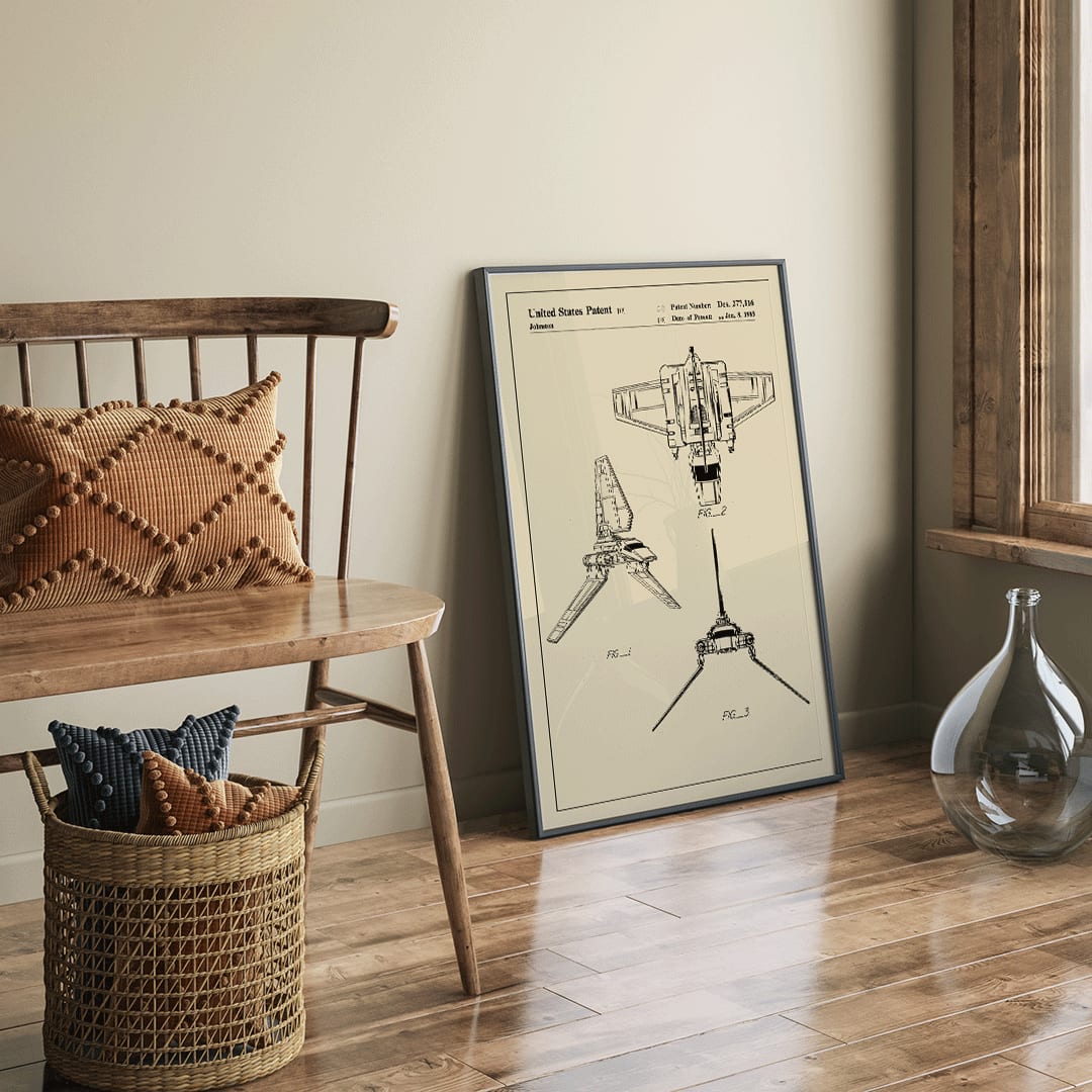 Technical drawings and vintage poster of Star Wars Imperial Shuttle patent artwork by Joe Johnston, framed and displayed in home decor