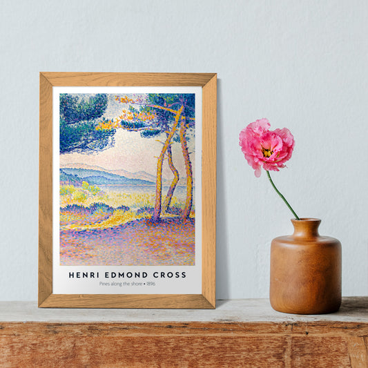 Colorful seascape poster of Pines Along the Shore by Henri Edmond Cross featuring vibrant pine trees and pointillist landscape, framed and displayed in home decor