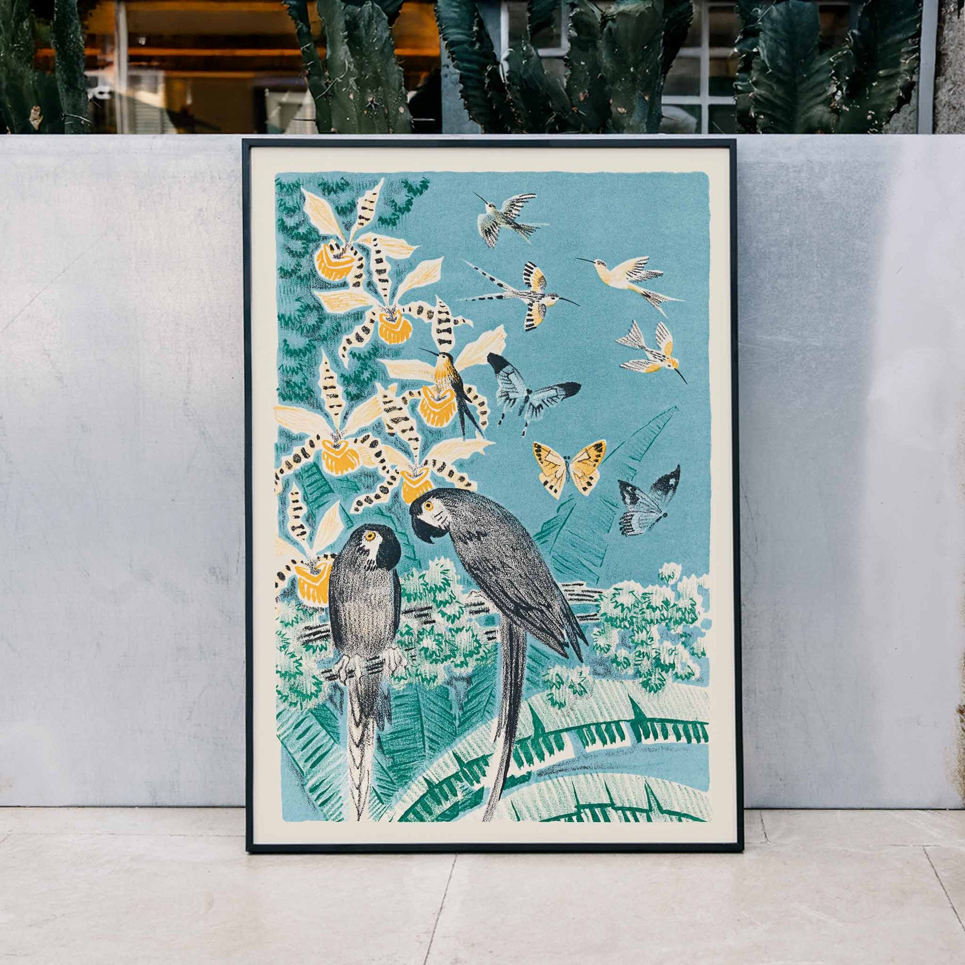 Colorful parrots butterflies and birds in a lush tropical garden illustration from Douze contes de Paris et de Provence by Paul Arène, framed and displayed in home decor