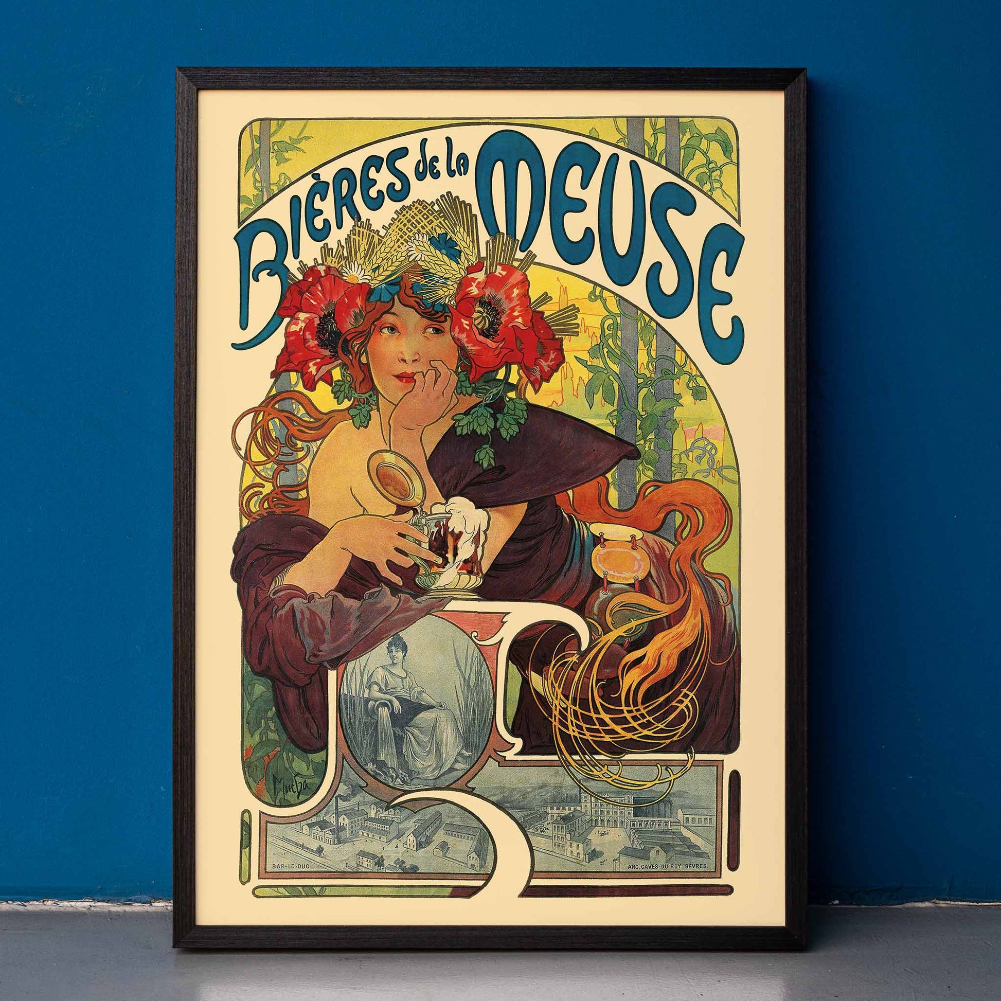 Art Nouveau poster of a woman with flowers in her hair holding a beer glass Bières De La Meuse by Alphonse Mucha, framed and displayed in home decor