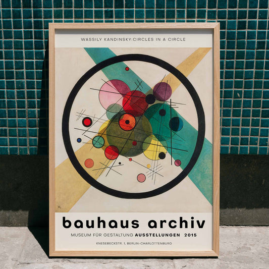 Wassily Kandinsky Circles in a Circle Bauhaus poster featuring abstract geometric shapes circles and lines for Bauhaus Archiv exhibition, framed and displayed in home decor