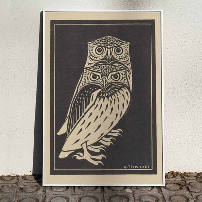 Stylized black and white owls artwork by Julie de Graag titled Two black and white owls illustration and poster, framed and displayed in home decor