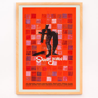 Closeup detail of Abstract red and black Saint Joan Movie poster by Saul Bass with stylized figure on checkered background and abstract red squares