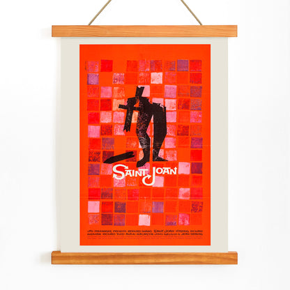 Abstract red and black Saint Joan Movie poster by Saul Bass with stylized figure on checkered background and abstract red squares, with wooden magnetic frame on white background