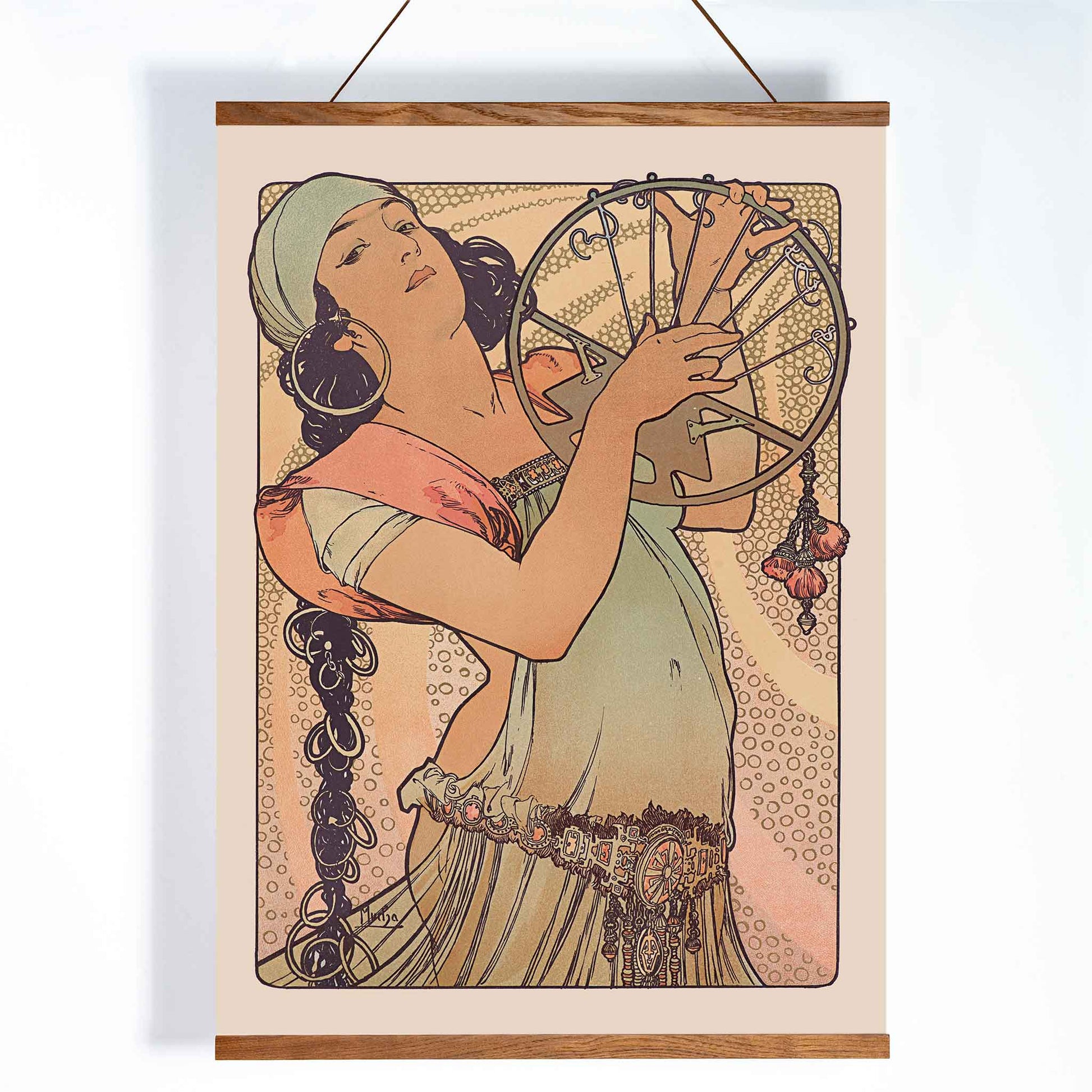 Alphonse Mucha Salome Art Nouveau poster elegant woman holding decorated circular motif in soft peach beige and green tones, with wooden magnetic frame on white background