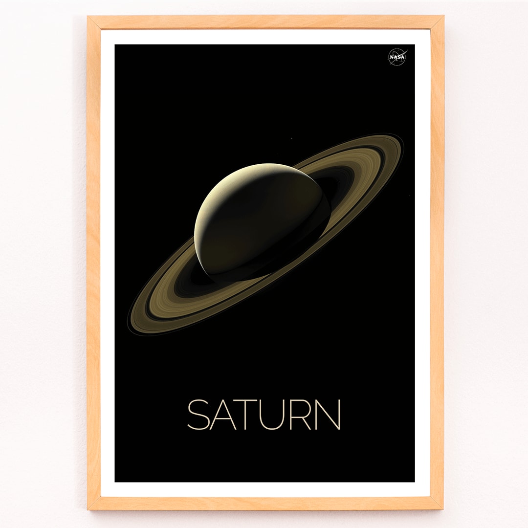 NASA illustration and poster of planet Saturn with rings against black background, framed and displayed in modern living room decor