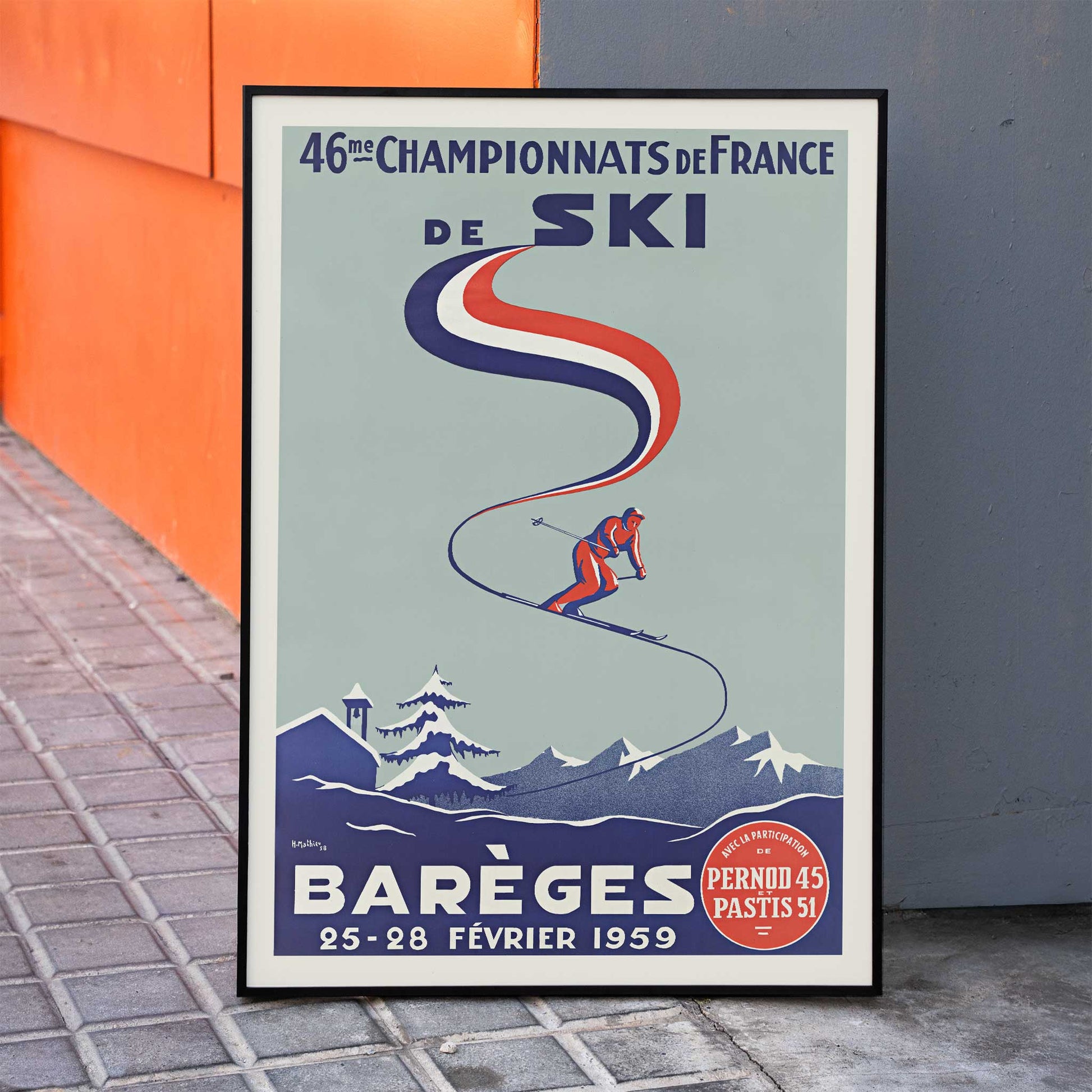 H. Mathieu French Ski Championships poster for Barèges with alpine skier, blue slopes, red and white ribbon graphics, snowy mountains, framed and displayed in modern living room decor