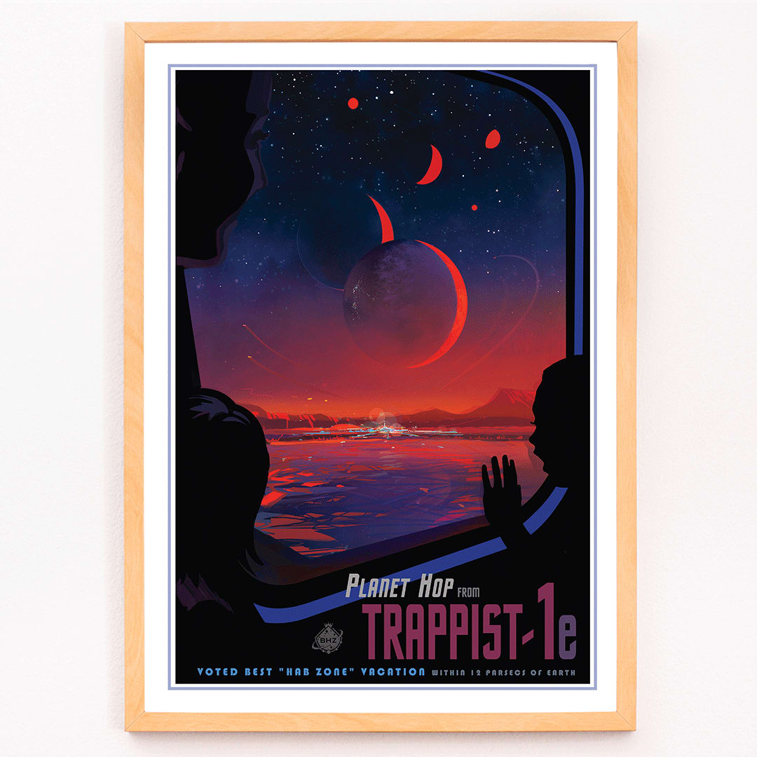 Colorful sci fi poster of TRAPPIST-1e by NASA showing vibrant alien landscape with planets glowing sky and silhouetted figures viewed from a window, framed and displayed in modern living room decor