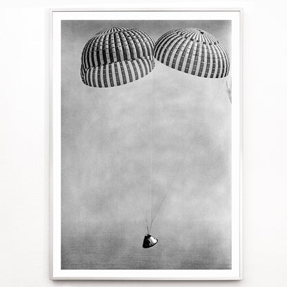 Closeup detail of Apollo 9 spacecraft with astronauts McDivitt Scott and Schweickart descending toward Atlantic splashdown with parachutes NASA recovery poster