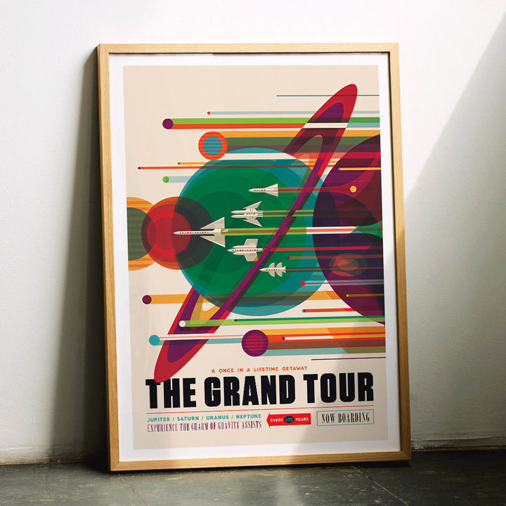 Retro space travel poster The Grand Tour by NASA featuring colorful planets and retro spaceships ideal for space exploration fans, framed and displayed in home decor