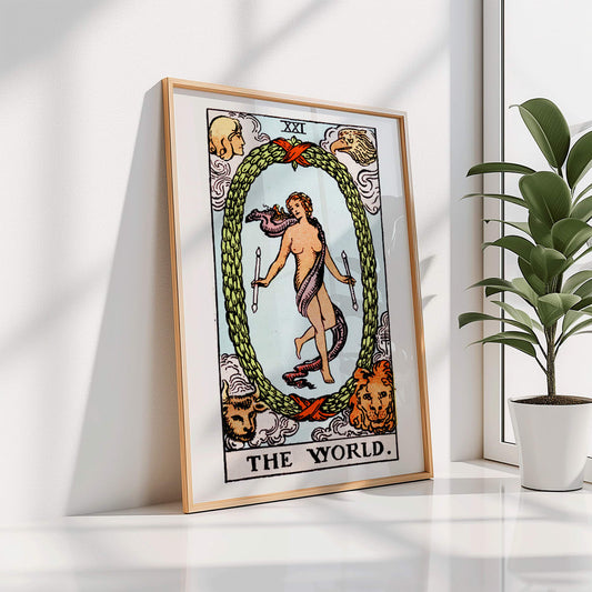 The World Tarot card by Rider Waite showing a central figure within an oval wreath surrounded by four figures representing the fixed signs, framed and displayed in home decor