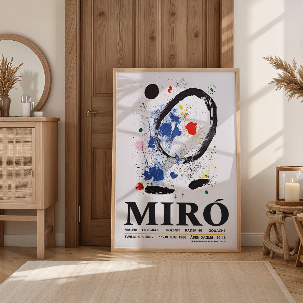 Twilights Ring exhibition poster inspired by Joan Miro featuring abstract artwork with bold colors and shapes, framed and displayed in home decor
