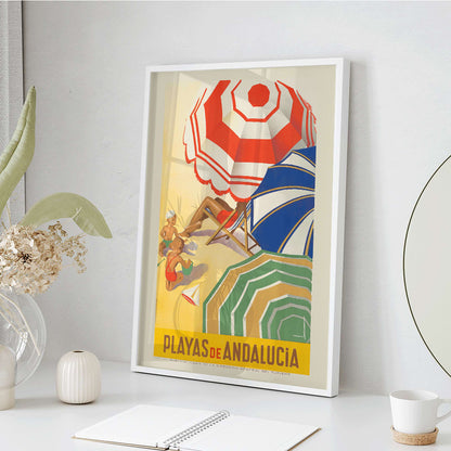 Vintage beach scene with colorful umbrellas children playing and sunbathers on sand Playas de Andalucia by Jose Morell tourism artwork, framed and displayed in home decor