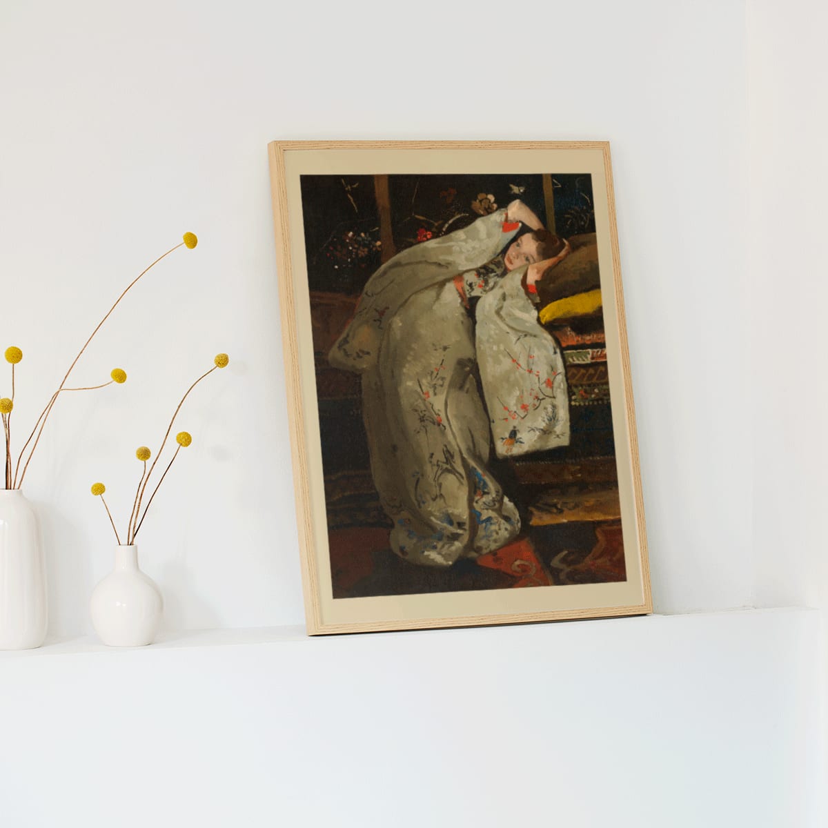 Girl in a white kimono resting on a couch artwork by George Hendrik Breitner painting poster, framed and displayed in modern living room decor
